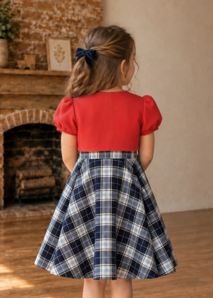 Frocks & Frolics Classic Bolero sewing pattern – back view of red puff sleeve bolero with navy plaid skirt