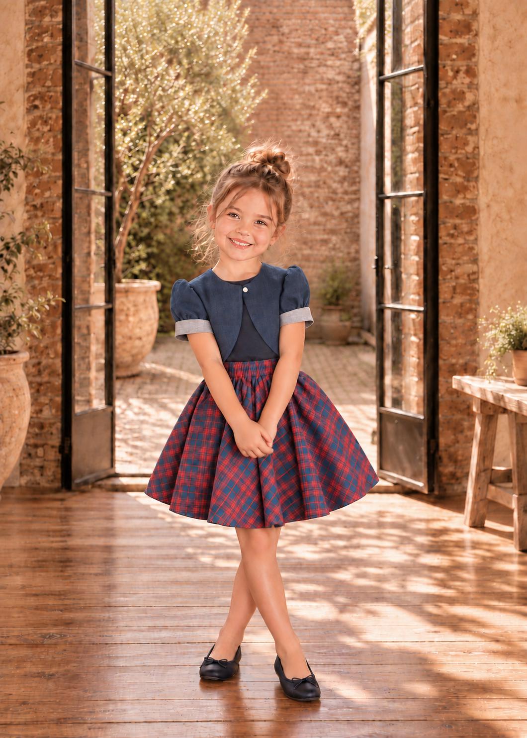 Frocks & Frolics Classic Bolero sewing pattern – navy bolero jacket with grey cuffs and red plaid skirt