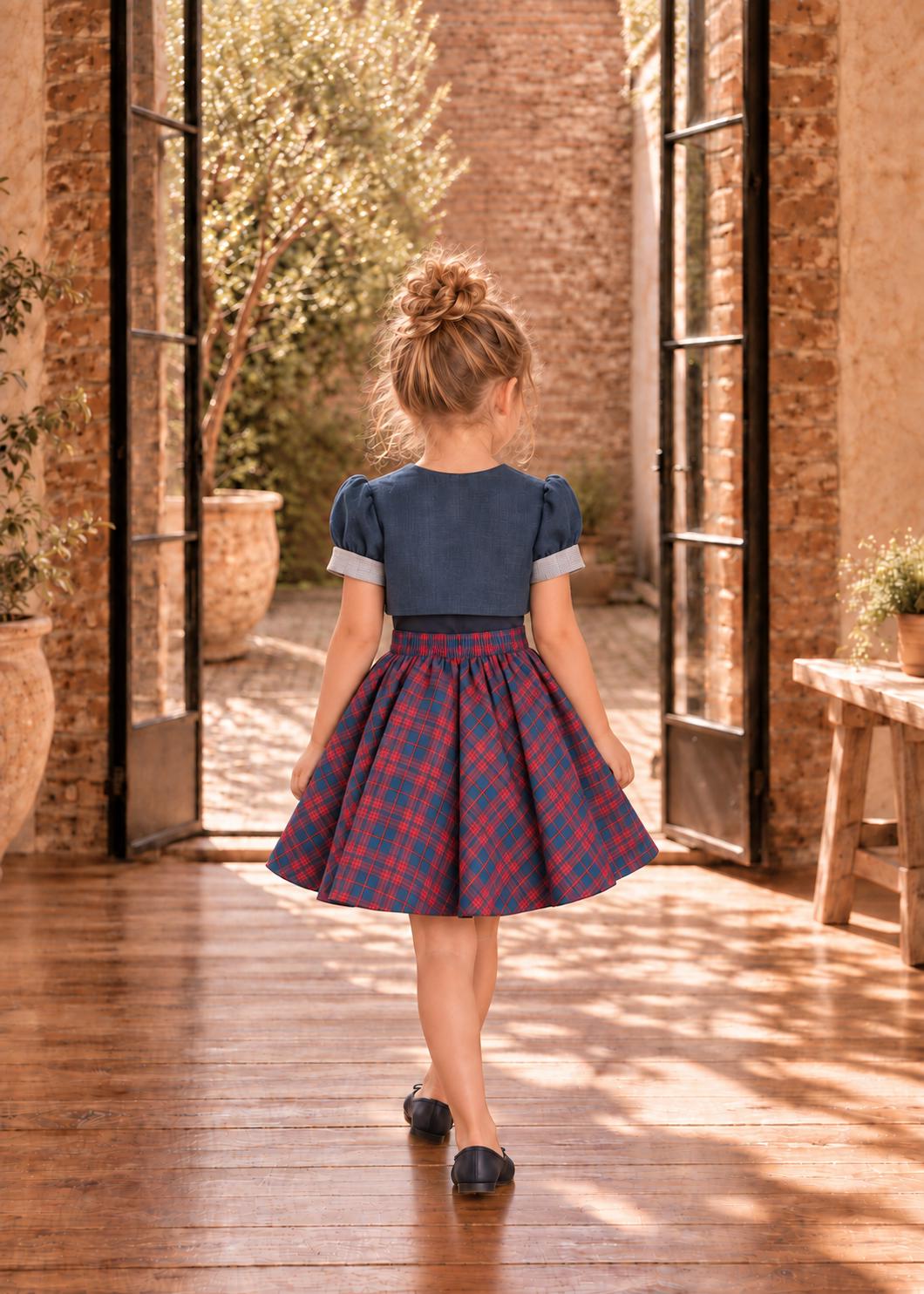 Frocks & Frolics Classic Bolero sewing pattern – back view of navy bolero jacket with plaid skirt