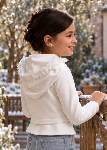 Frocks & Frolics Joanna cardigan sewing pattern – back view of white hooded cardigan with ruffle trim