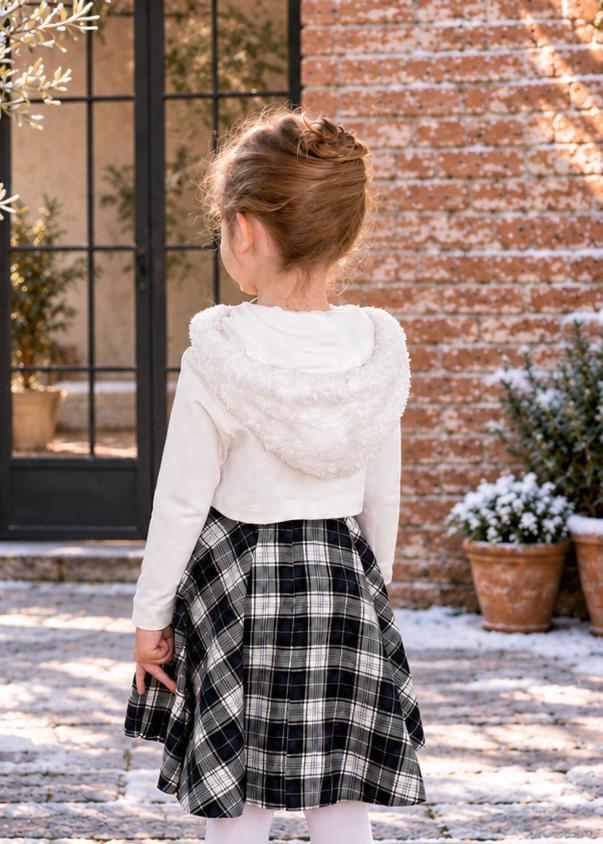 Frocks & Frolics Joanna cardigan sewing pattern – back view of white hooded cardigan with plaid skirt