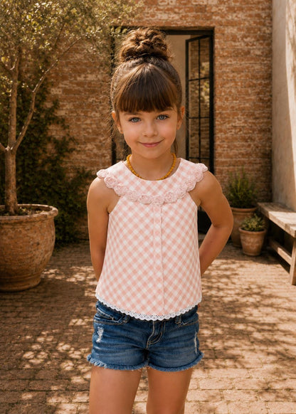Frocks & Frolics Kitty top sewing pattern – pink gingham top with fabric rosette collar and lace hem, with denim shorts