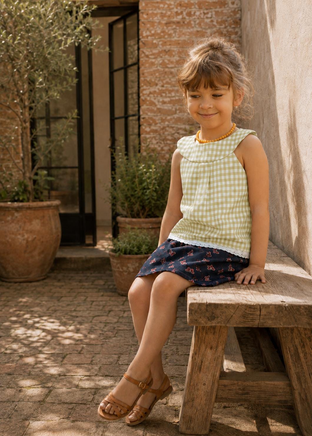 Frocks & Frolics Kitty top sewing pattern – green gingham top with wide collar and lace hem