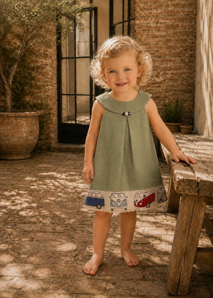 Frocks & Frolics Kitty dress sewing pattern – sage green dress with round collar and camper van print hem band