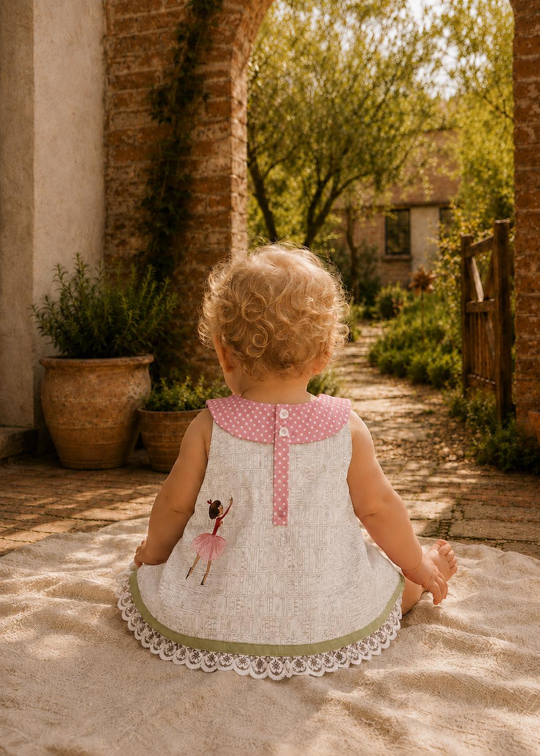 Frocks & Frolics Kitty dress sewing pattern – back view of grey dress with polka dot collar and button placket
