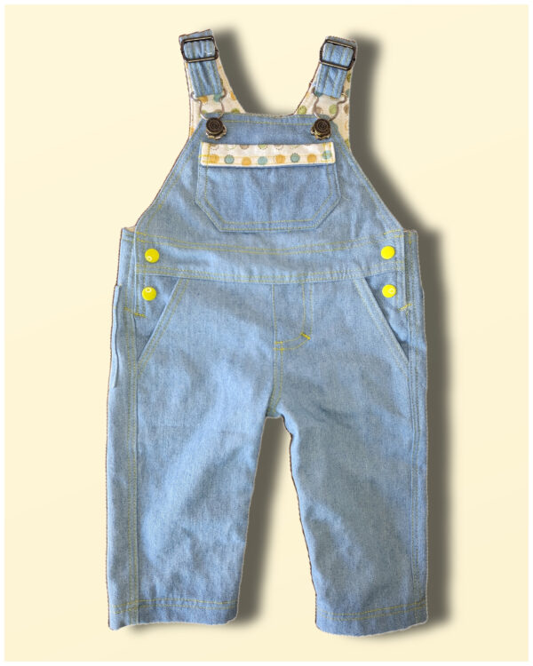 Front view of the Bobby Dazzler Dungarees with inner leg popper closure. Romper sewing pattern by frocks and frolics