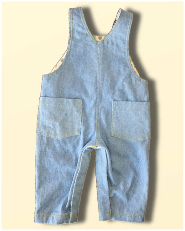 Back view of the Bobby Dazzler Dungarees with inner leg popper closure. Romper sewing pattern by frocks and frolics