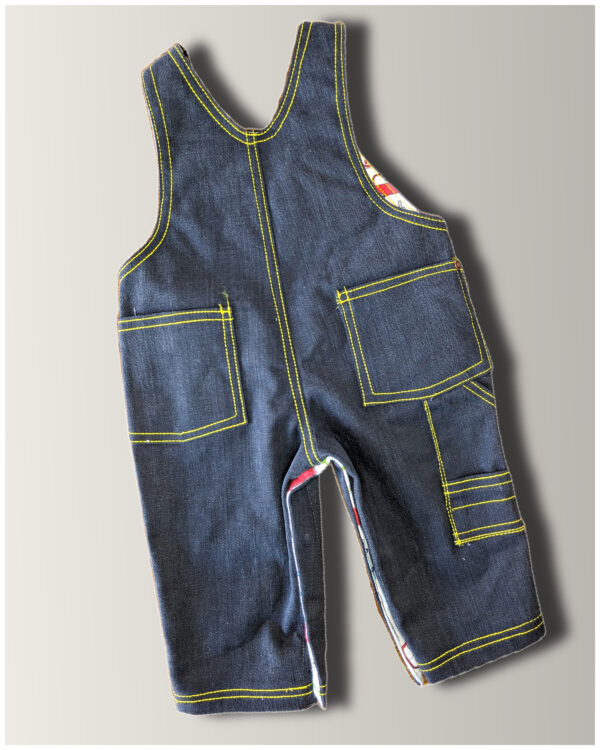 Back view of the Dungarees topstitched with yellow thread on denim. Romper sewing pattern by frocks and frolics